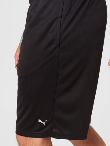 PUMA Regular Sportshorts in Schwarz