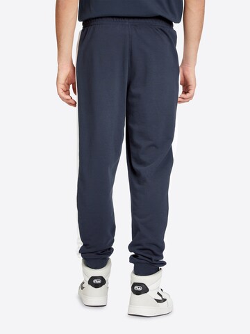 FILA Loose fit Pants ' LANGWEDEL ' in Blue