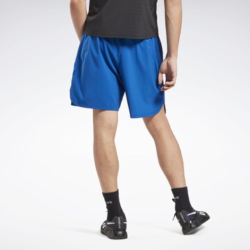 Reebok Štandardný strih Športové nohavice 'Speed 3.0' - Modrá