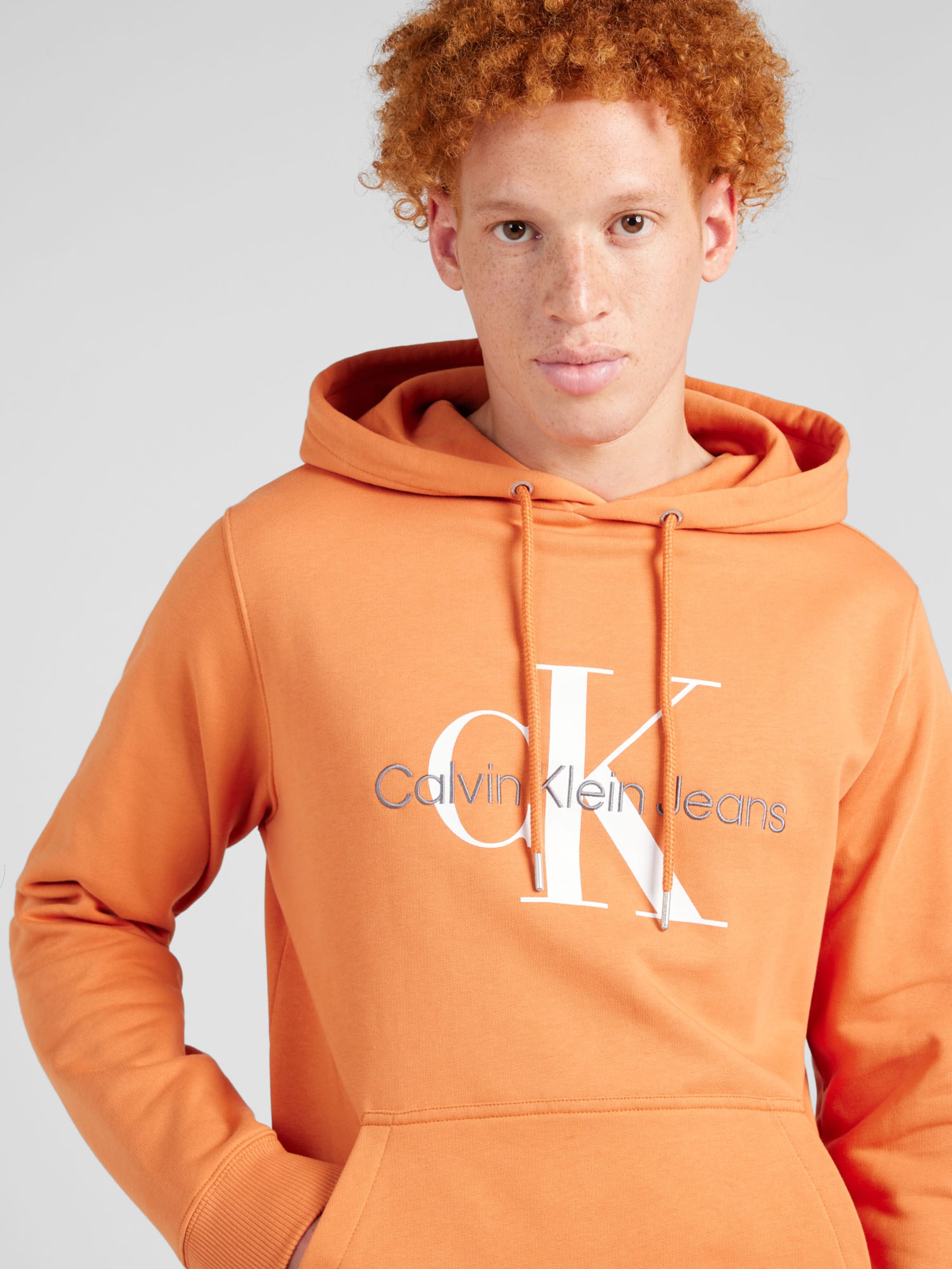 Felpa calvin sales klein arancione