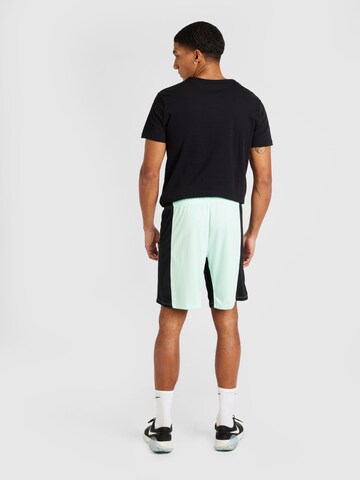 NIKE Regular Urheiluhousut 'FC Chelsea London' värissä vihreä