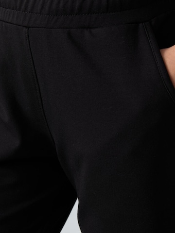 Regular Pantalon Tommy Life en noir