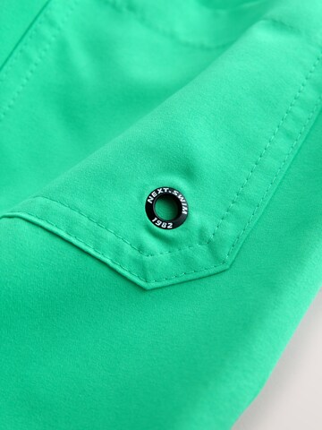 Next Plavecké šortky – zelená