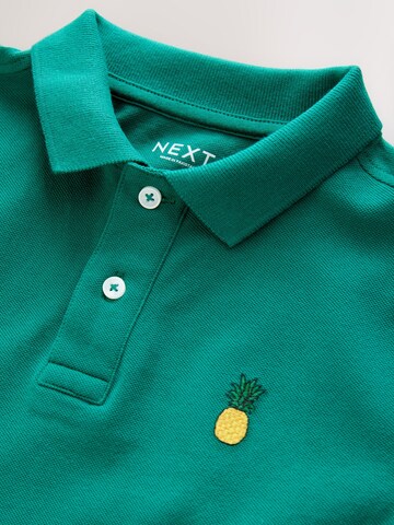 Next Poloshirt in Grün