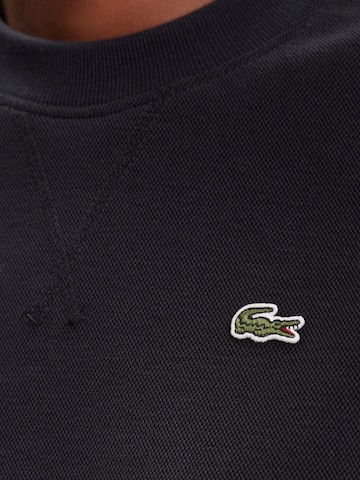 LACOSTE Sweatshirt i blå