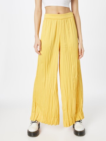 Wide leg Pantaloni di Warehouse in giallo: frontale