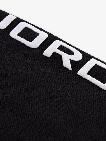 Jordan Облекло за бягане 'ESS FLC' в черно