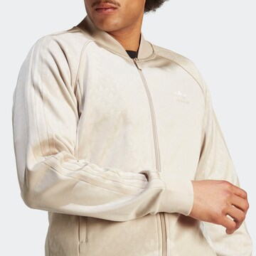 Veste de survêtement 'Graphics Monogram Sst' ADIDAS ORIGINALS en beige