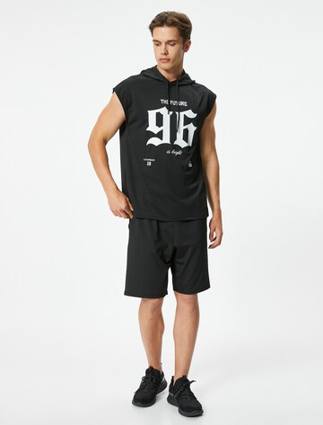 Koton T-Shirt in Schwarz