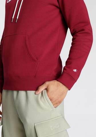 Champion Authentic Athletic Apparel Sweatshirt i röd