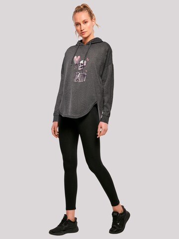 Sweat-shirt 'Skelett hält Herzballon' F4NT4STIC en gris