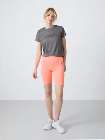Tapered Leggings 'Gamaschen' di Tommy Life in arancione