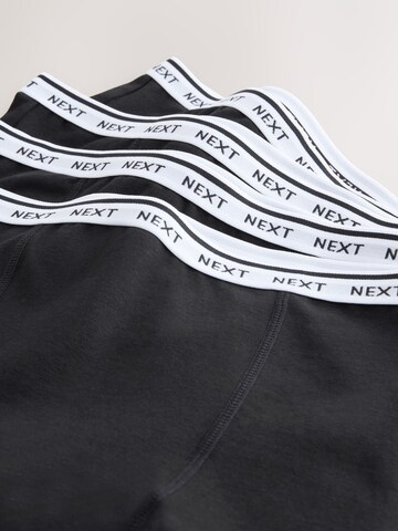 Next Spodnje hlače | črna barva