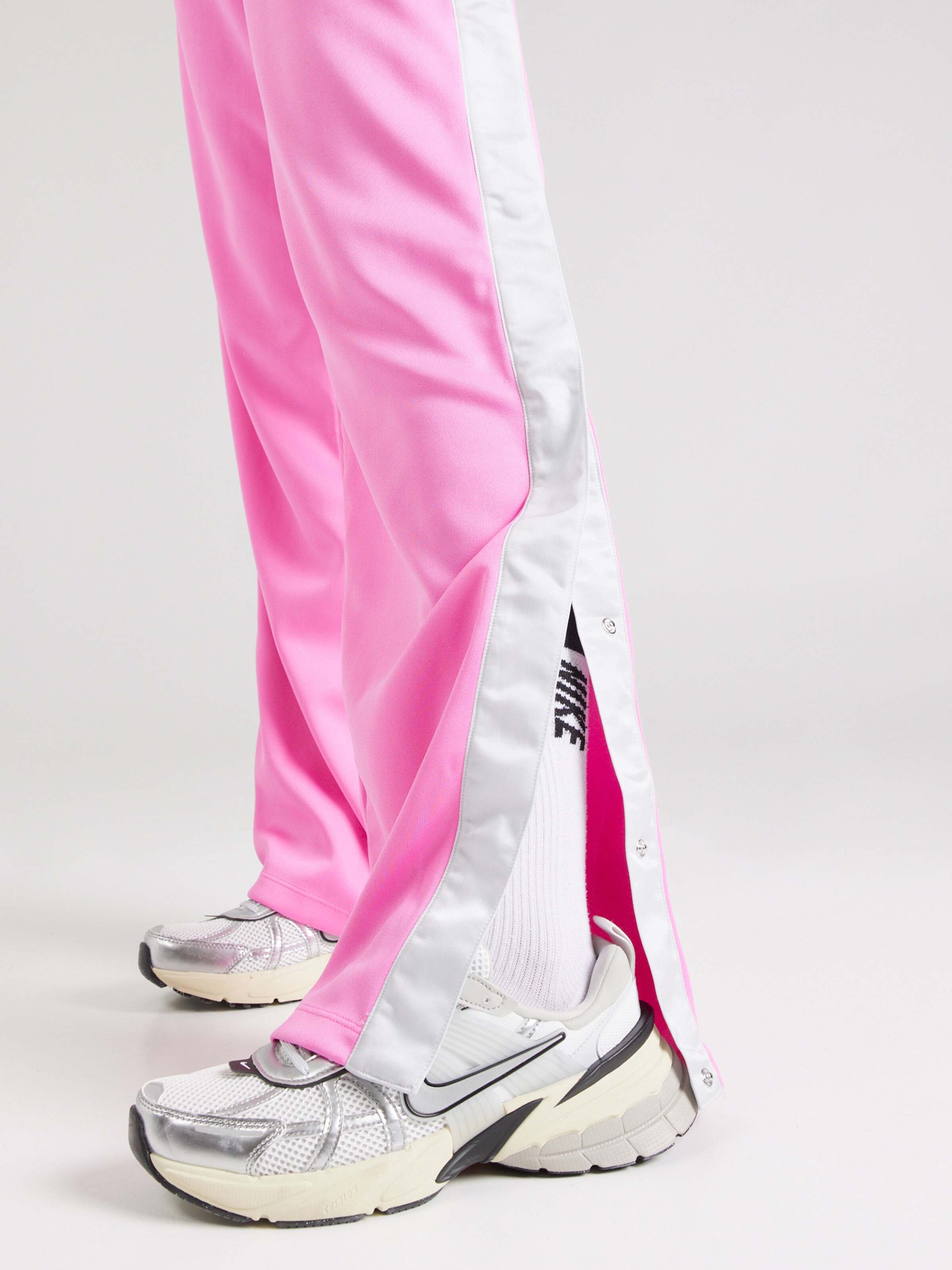 Nike Sportswear Loose fit Trousers Air Breakaway in Pink ABOUT YOU