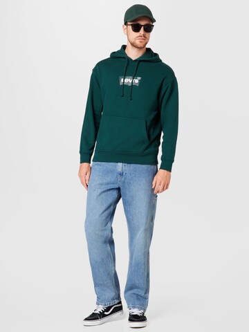 LEVI'S ®Regular Fit Sweater majica 'Relaxed Graphic Hoodie' - zelena boja