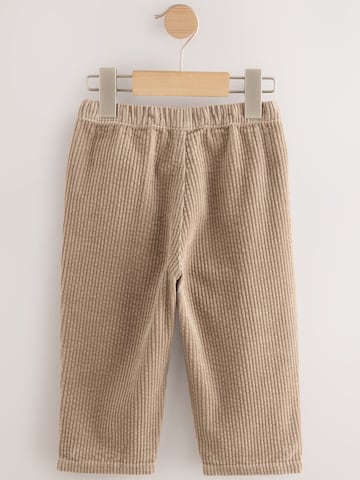 Next Zwężany krój Spodnie w kolorze beżowy