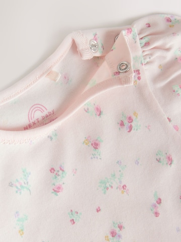 Next - Pijama entero/body en rosa