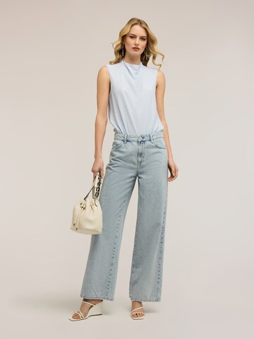 Top di MOTIVI in blu
