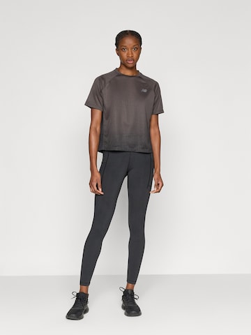 new balance - Camiseta funcional en negro