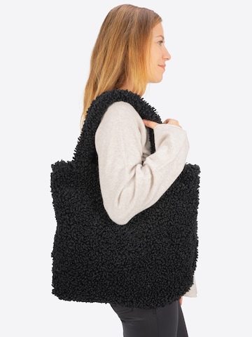 Seasons of April Schultertasche in Schwarz: Vorderseite