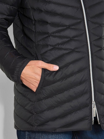 Goldner Tussenjas in Zwart