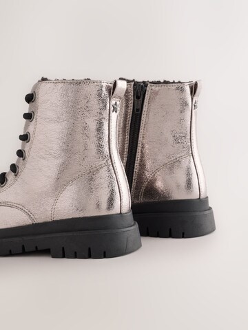 Bottes Next en argent