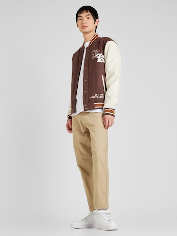 Karl Kani Between-season jacket 'Old English' in Brown