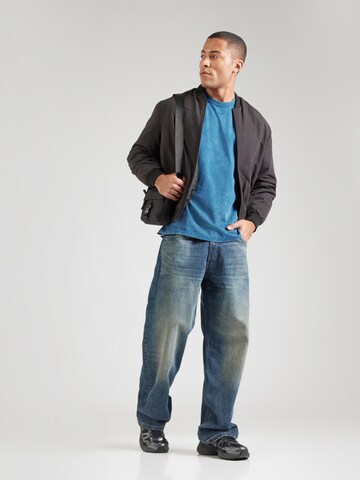 T-Shirt 'ESS' Nike Sportswear en bleu