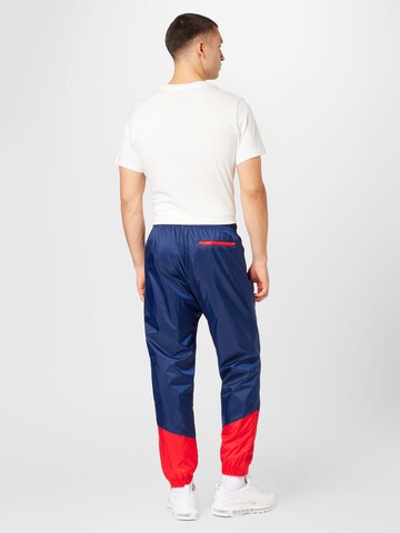 Nike Sportswear Tapered Hose in Blau