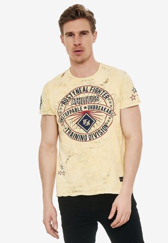 Rusty Neal T-Shirt mit großem Frontprint in Gelb: predná strana