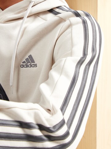 ADIDAS SPORTSWEAR Αθλητική μπλούζα φούτερ 'Essentials' σε μπεζ