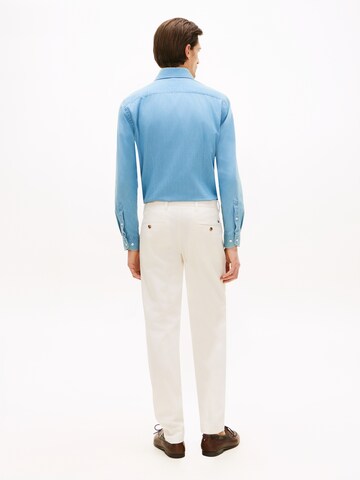 TOMMY HILFIGER Slimfit Housut värissä keltainen