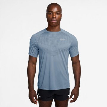 NIKE Performance Shirt 'DFADV STRIDE' in Blue: front