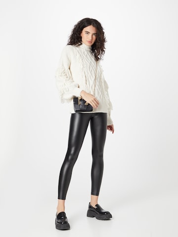 Skinny Leggings di River Island in nero