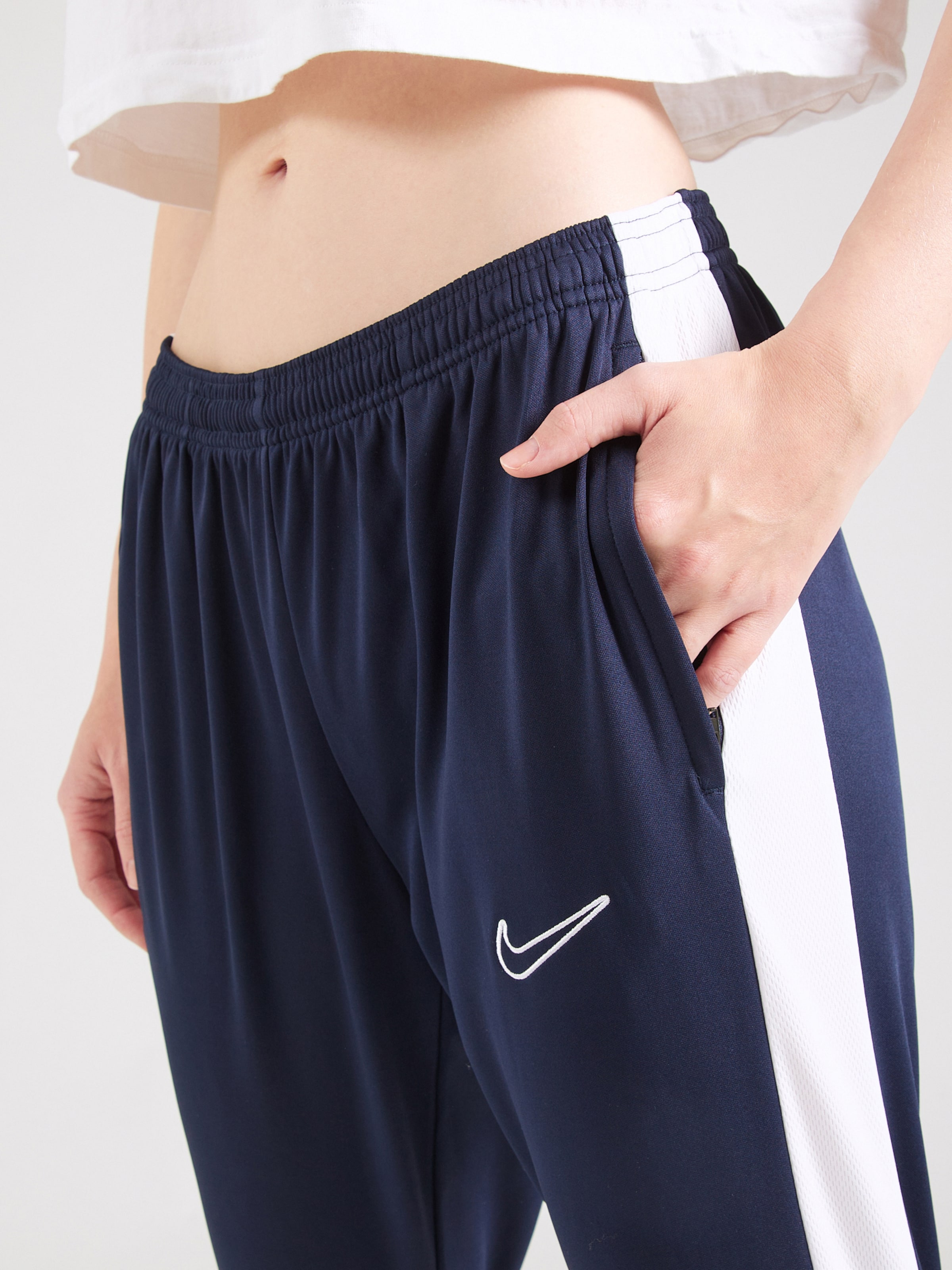NIKE Tapered Sports trousers ACADEMY in Navy ABOUT YOU