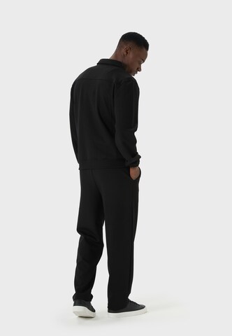 Tenue d'intérieur Tom Barron en gris : derrière