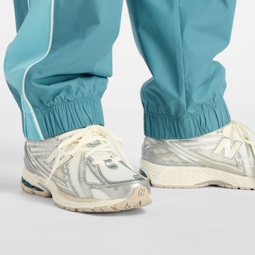 new balance Wide Leg Sporthose 'Trackside' in Blau
