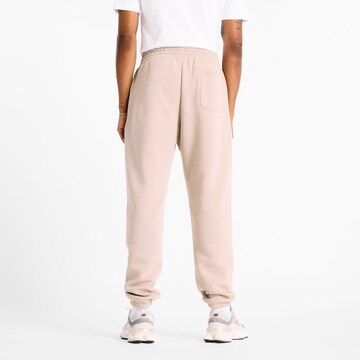 Effilé Pantalon 'Essentials' new balance en beige
