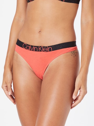 Calvin Klein Underwear Стринг в оранжево: отпред