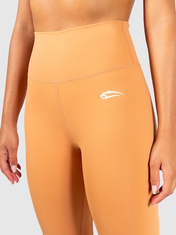 Smilodox Skinny Workout Pants 'Affectionate' in Orange