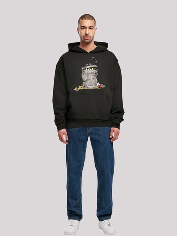 F4NT4STIC Sweatshirt 'Sesame Street Oscar Tresh Box' in Black