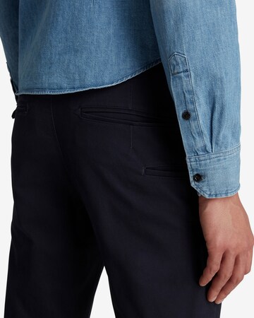 Coupe slim Pantalon chino G-Star RAW en bleu