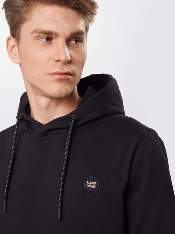 Superdry Regular Fit Hoodie 'Collective' in Schwarz