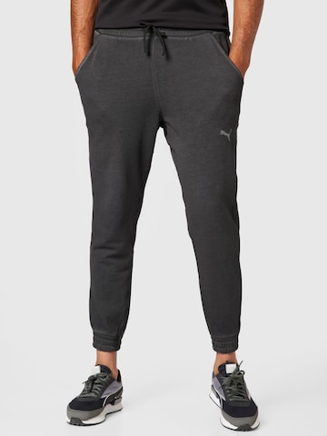 Effilé Pantalon de sport PUMA en noir : devant