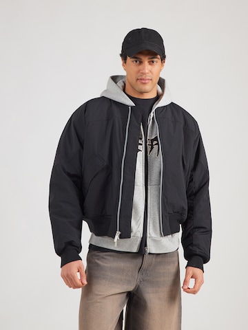 Jordan Jacke 'FLT RNGD' in Schwarz: Vorderseite