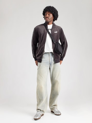 Veste de survêtement 'ESS' PUMA en noir