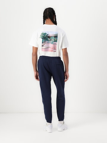 Nike Sportswear Tapered Trousers 'CLUB' in Blue