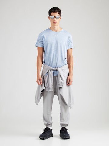 PUMA Funkcionalna majica 'TAD ESSENTIALS' | modra barva