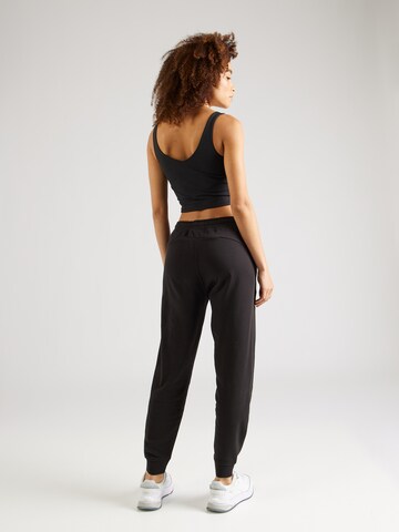 PUMA Tapered Sportbroek in Zwart