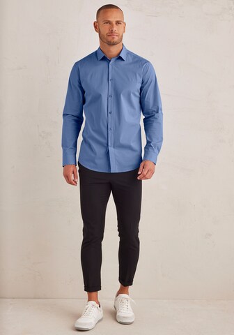 Coupe regular Chemise business JOHN DEVIN en bleu